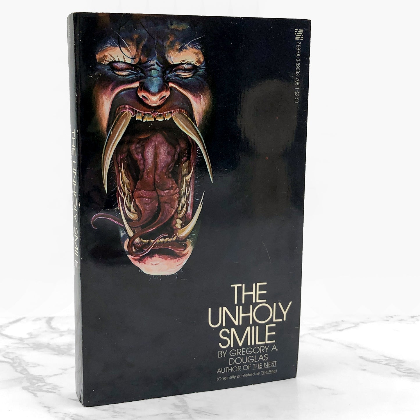 The Unholy Smile by Gregory A. Douglas [FIRST EDITION PAPERBACK] 1979 • Zebra Horror • Mint!