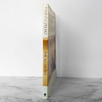 The Alchemist by Paulo Coelho [10th ANNIV. PAPERBACK / 1998]