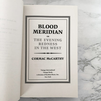 Blood Meridian or the Evening Redness in the West by Cormac McCarthy [TRADE PAPERBACK] 2010