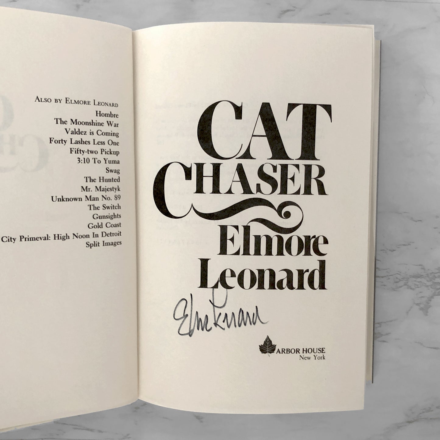 Cat Chaser by Elmore Leonard SIGNED! [FIRST EDITION • FIRST PRINTING] 1982