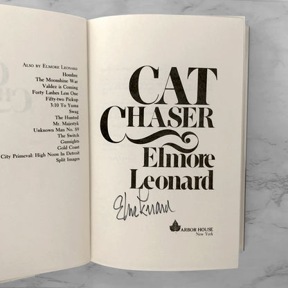 Cat Chaser by Elmore Leonard SIGNED! [FIRST EDITION • FIRST PRINTING] 1982