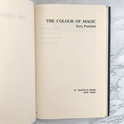 The Colour of Magic by Terry Pratchett [FIRST BOOK CLUB EDITION] 1983 • St. Martin's Press