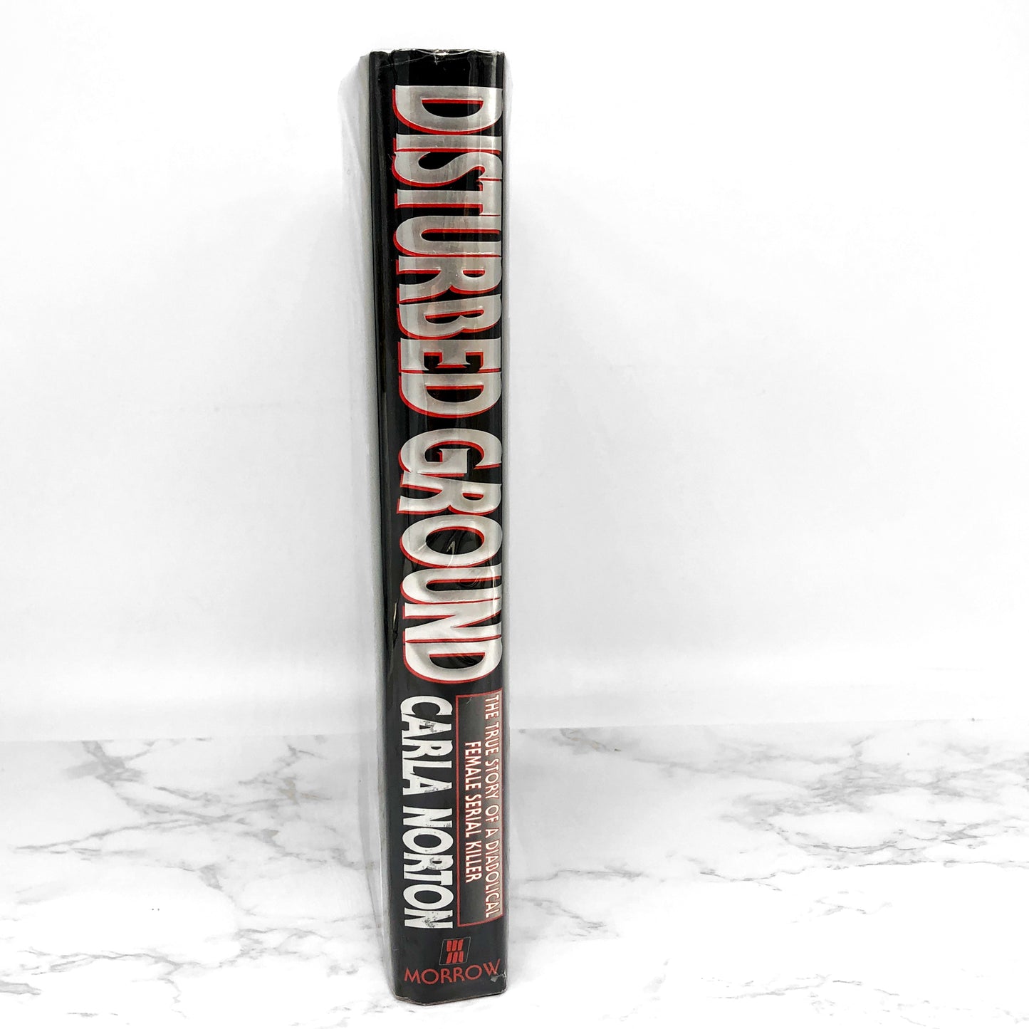 Disturbed Ground: The True Story of a Diabolical Female Serial Killer by Carla Norton [FIRST EDITION] 1994