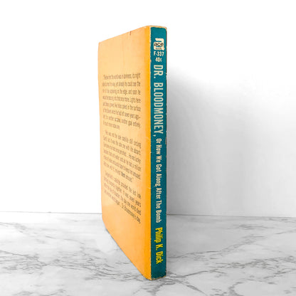 Dr. Bloodmoney by Philip K. Dick [FIRST EDITION / FIRST PRINTING] 1965 Ace Books