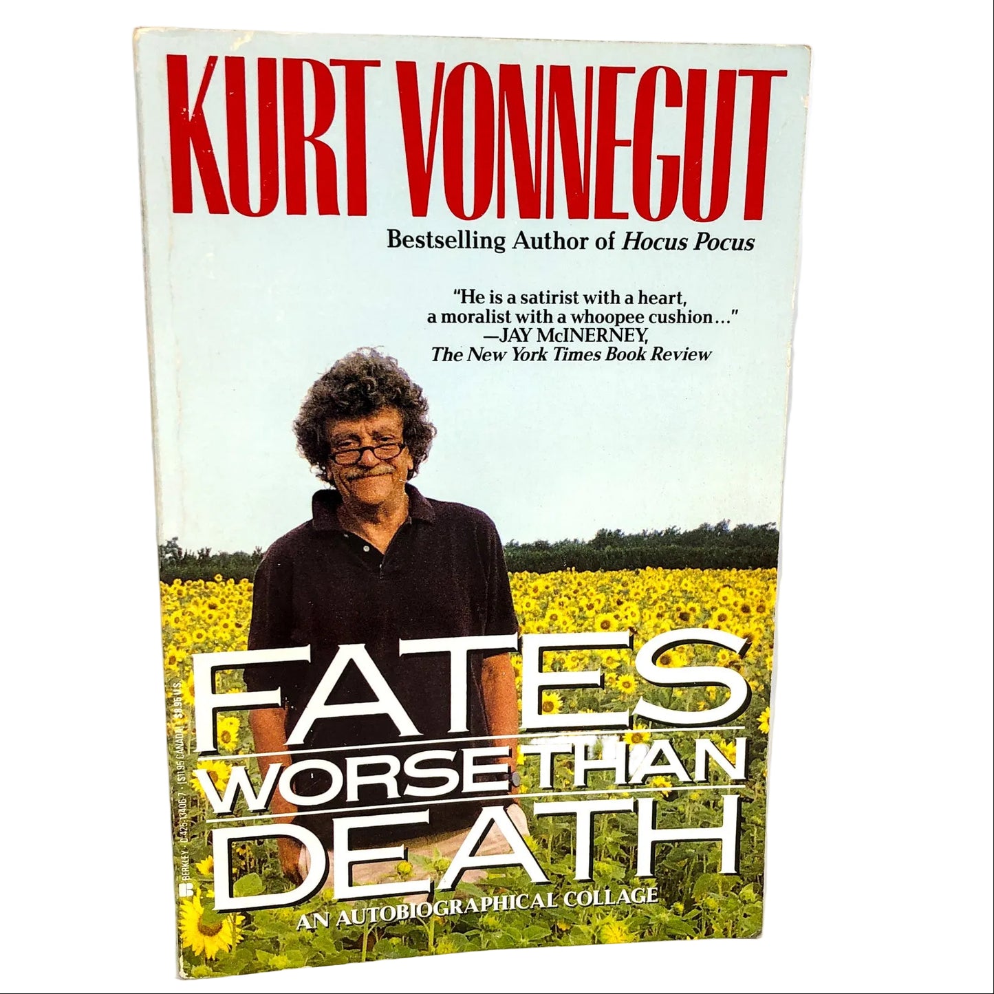 The cover of the book 'Fates Worse Than Death' by Kurt Vonnegut features a photograph of the author with a backdrop of yellow flowers, indicating the title and author's name.