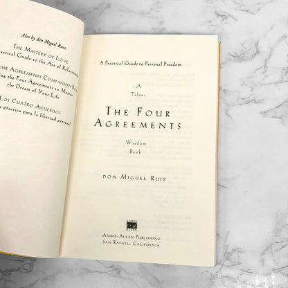 The Four Agreements by Don Miguel Ruiz [FIRST EDITION PAPERBACK] 1997 • Amber-Allen
