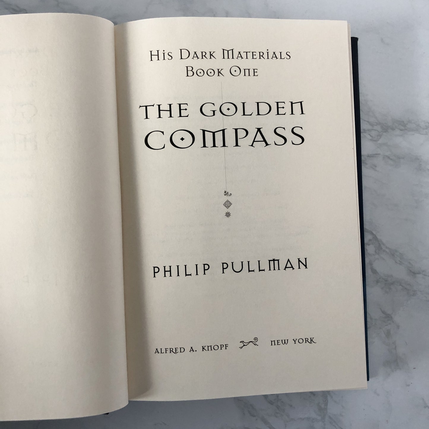 The Golden Compass by Philip Pullman [FIRST EDITION] - Bookshop Apocalypse