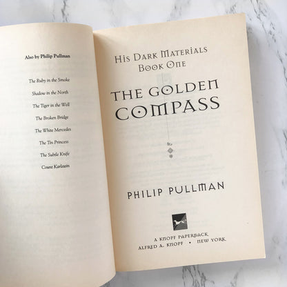 The Golden Compass by Philip Pullman [TRADE PAPERBACK / 1998]
