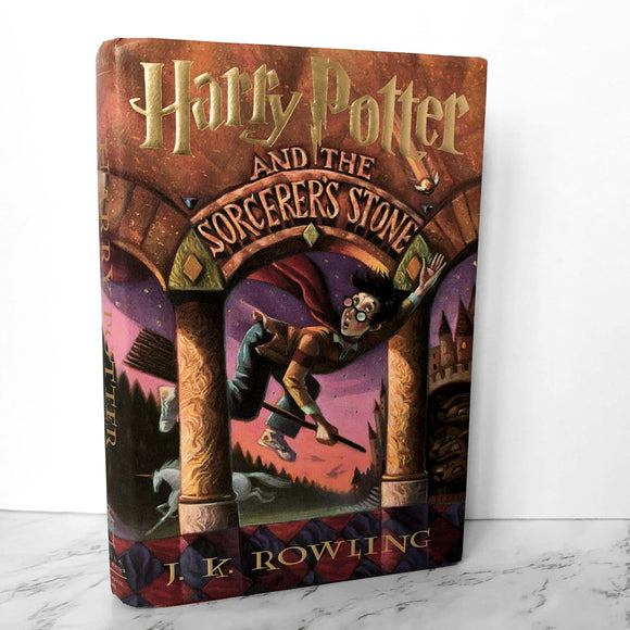 Harry Potter and the Sorceror's Stone by J.K. Rowling [FIRST EDITION / EIGHTH PRINTING] - Bookshop Apocalypse