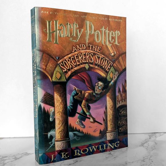 Harry Potter and the Sorcerer's Stone by J.K. Rowling [FIRST PAPERBACK EDITION]