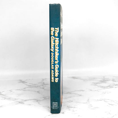 The Hitchhikers Guide to the Galaxy by Douglas Adams [25th ANNIVERSARY FACSIMILE HARDCOVER]