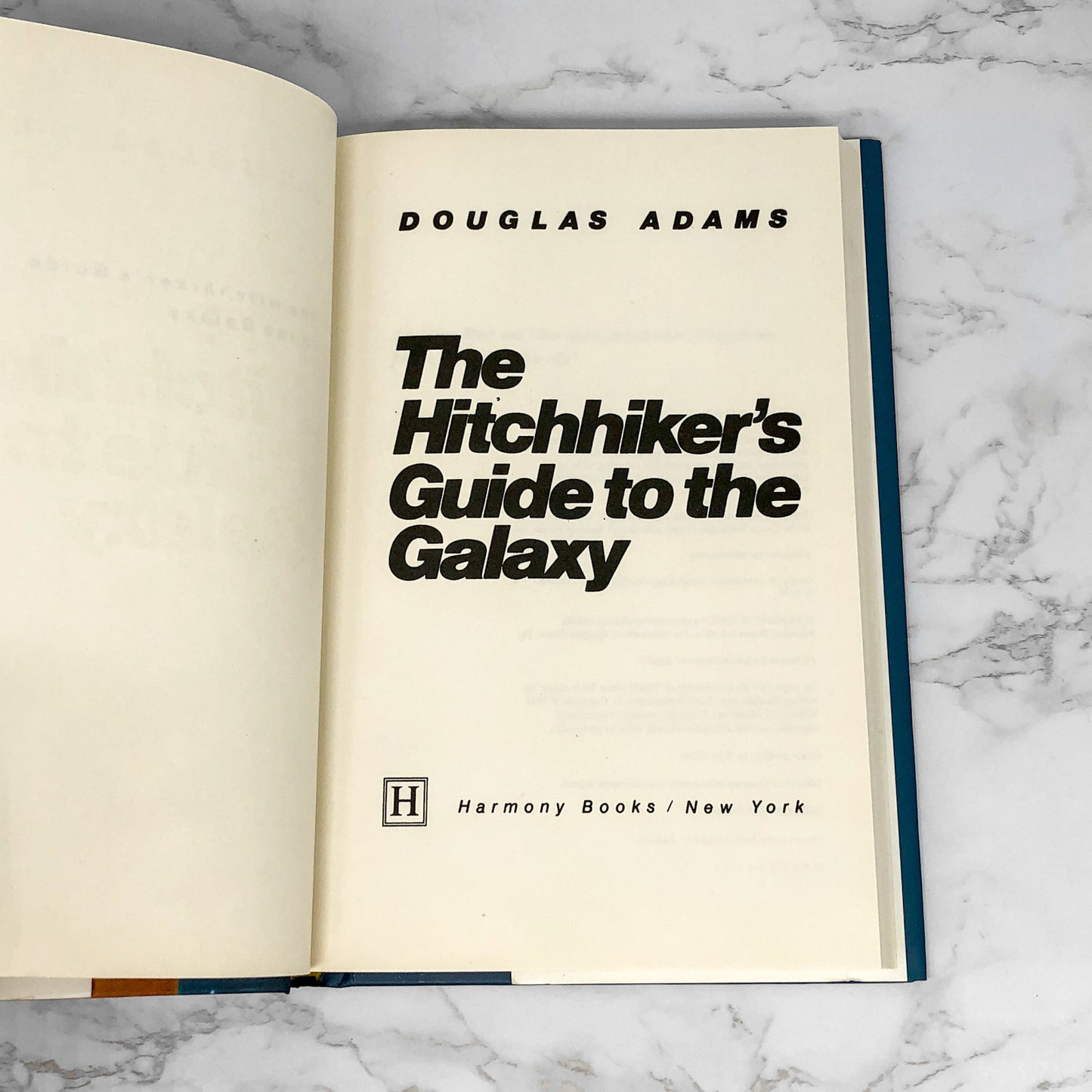 The Hitchhikers Guide to the Galaxy by Douglas Adams [25th ANNIVERSARY FACSIMILE HARDCOVER]
