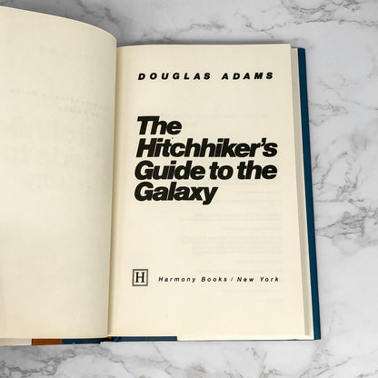 The Hitchhikers Guide to the Galaxy by Douglas Adams [25th ANNIVERSARY FACSIMILE HARDCOVER]
