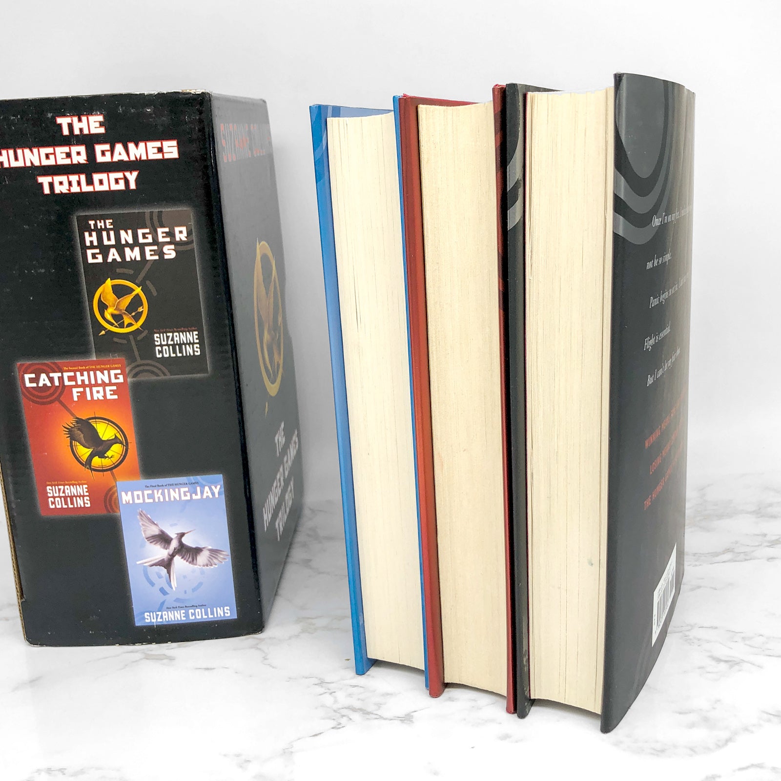 The Hunger Games. by Suzanne Collins. First Edition First 