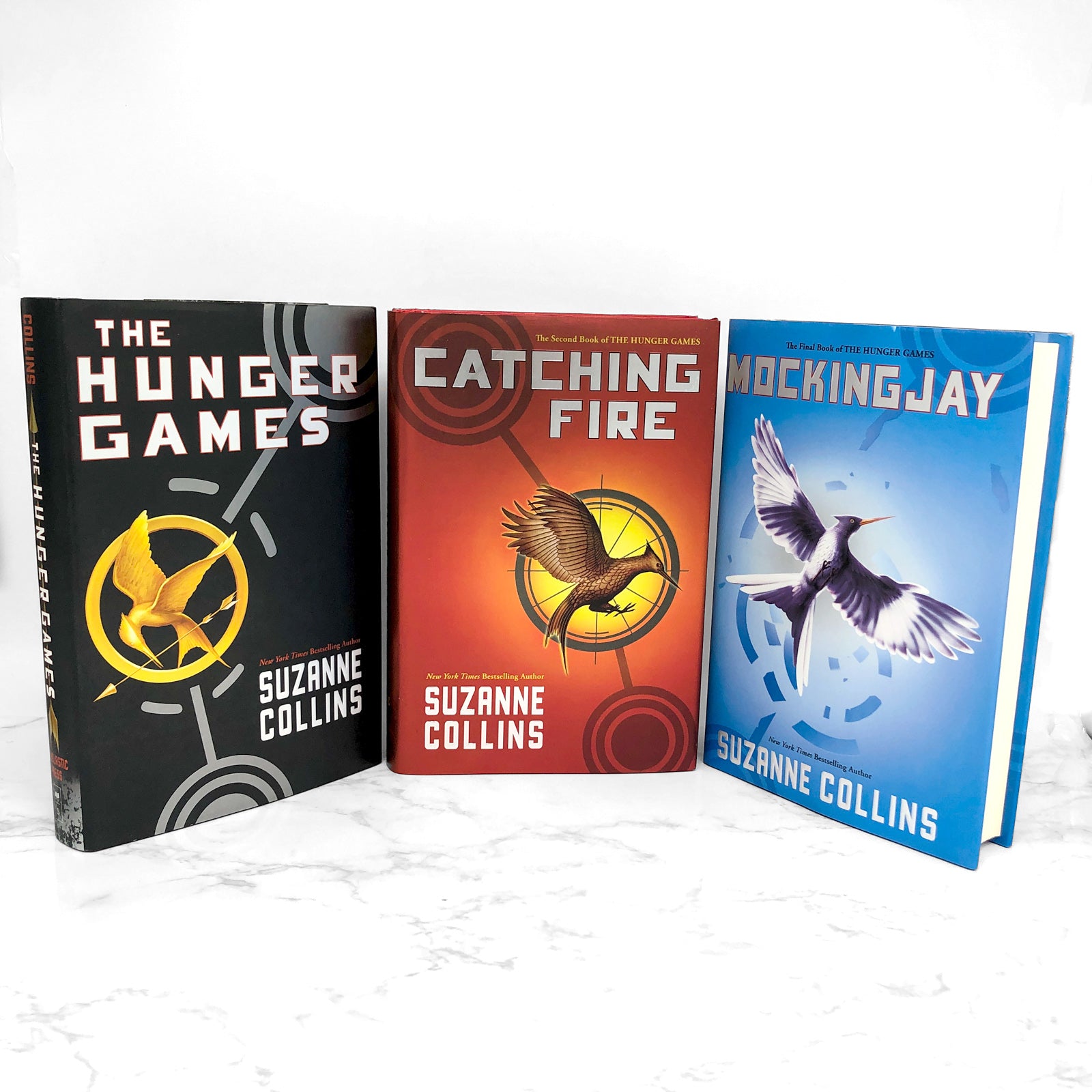  The Hunger Games Trilogy Boxed Set: 8601400319468: Collins,  Suzanne: Books