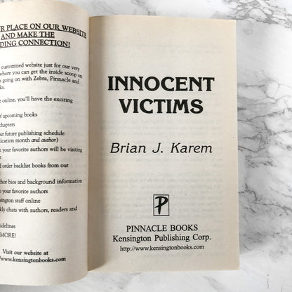 Innocent Victims by Brian J. Karem [2001 PAPERBACK]