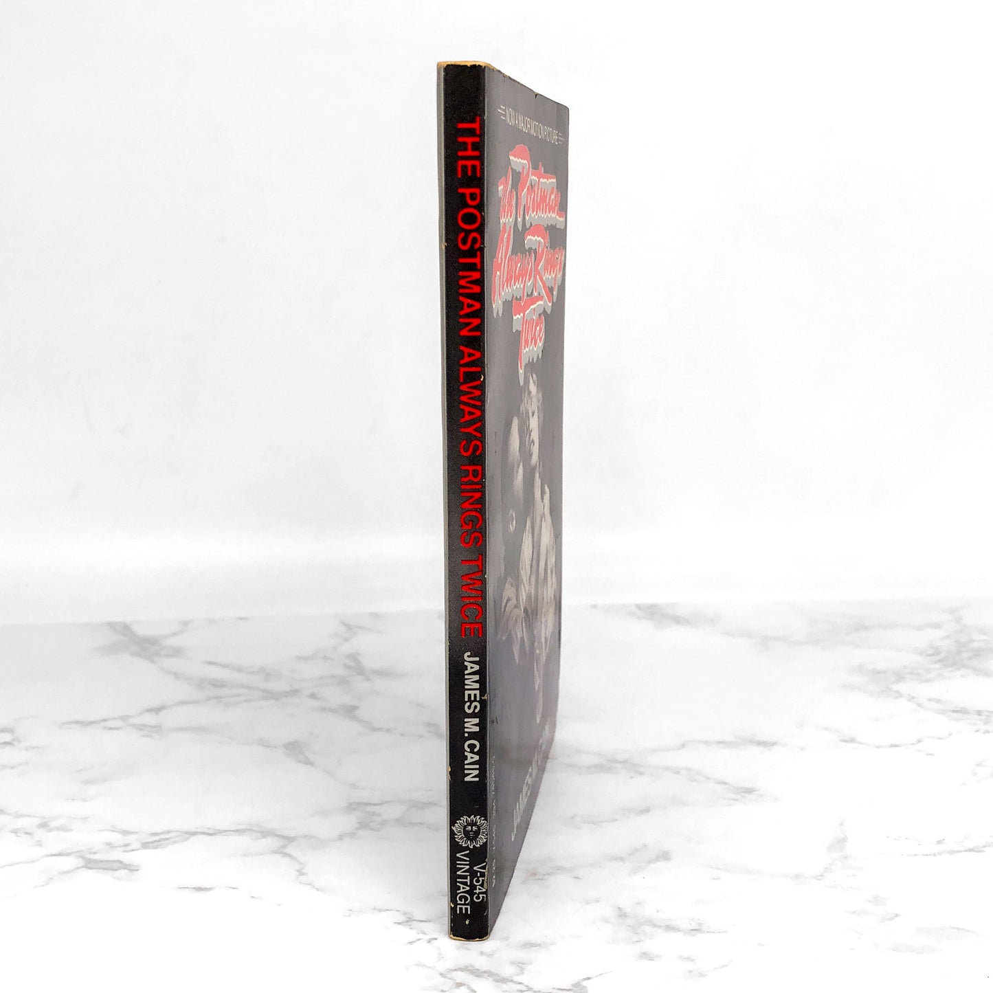 The Postman Always Rings Twice by James M. Cain [MOVIE TIE-IN PAPERBACK] 1981 • Vintage