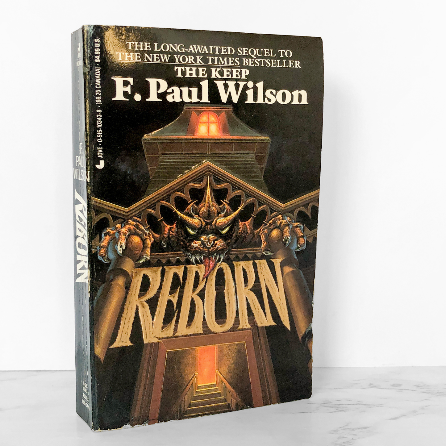 Reborn by F. Paul Wilson [FIRST PAPERBACK PRINTING / 1990]