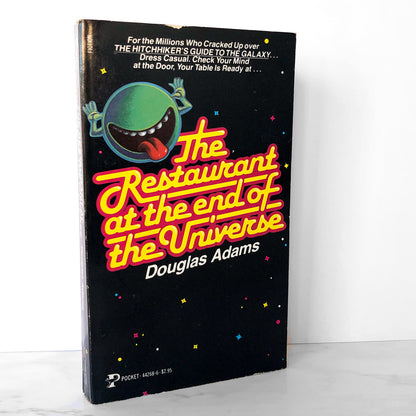 The Restaurant at the End of the Universe by Douglas Adams [FIRST PAPERBACK PRINTING / 1982]