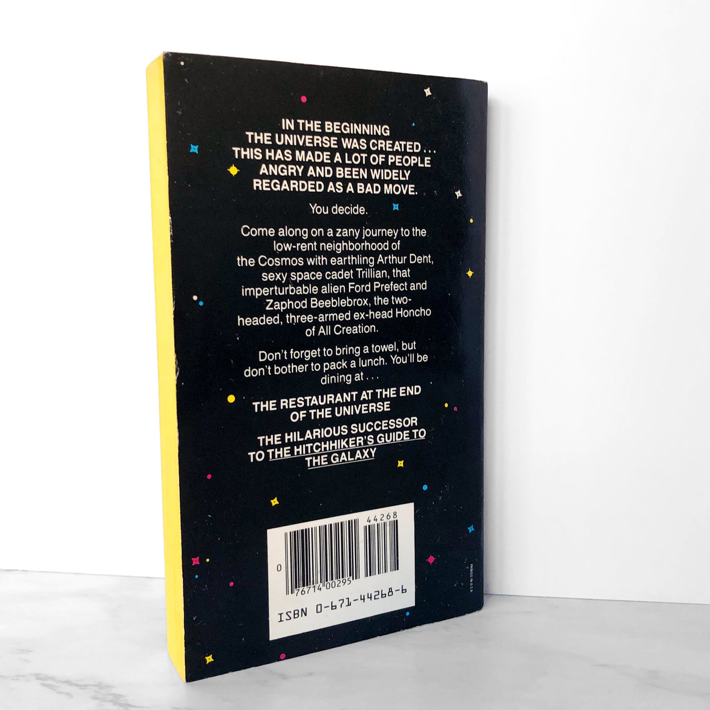 The Restaurant at the End of the Universe by Douglas Adams [FIRST PAPERBACK PRINTING / 1982]