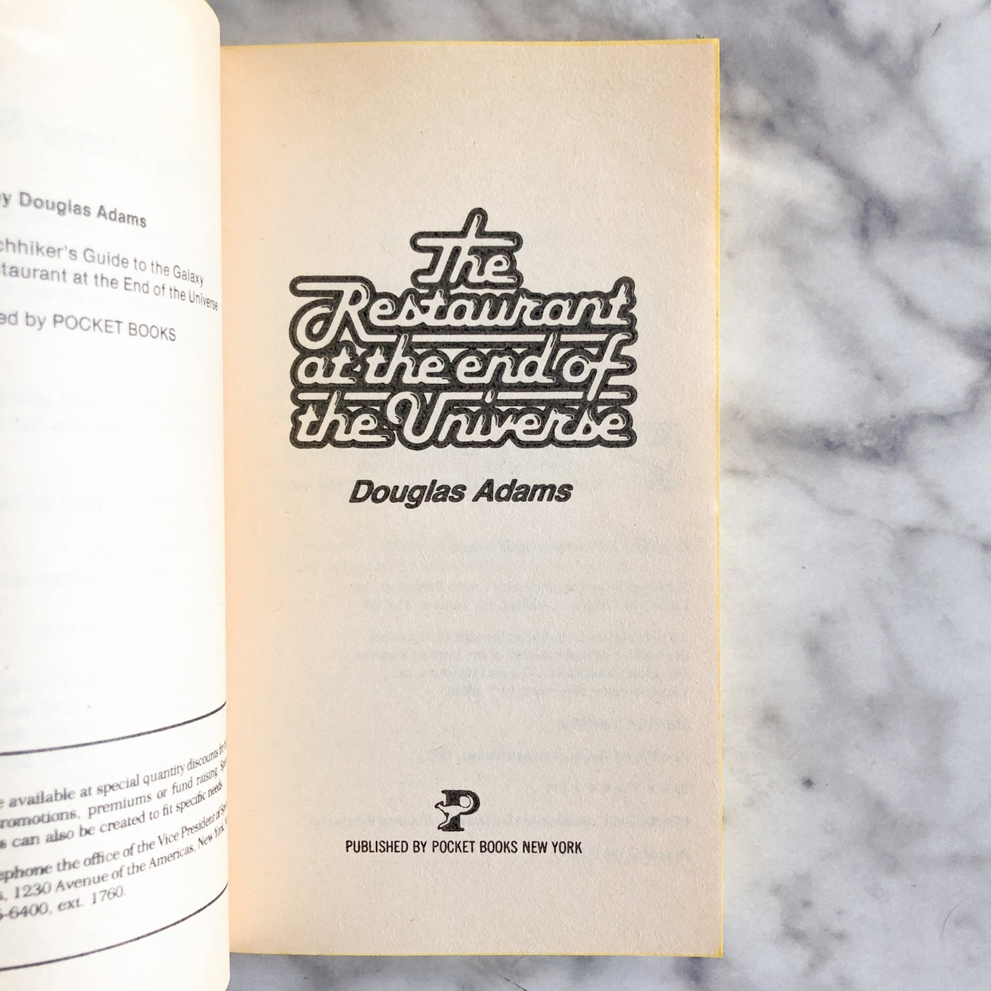 The Restaurant at the End of the Universe by Douglas Adams [FIRST PAPERBACK PRINTING / 1982]