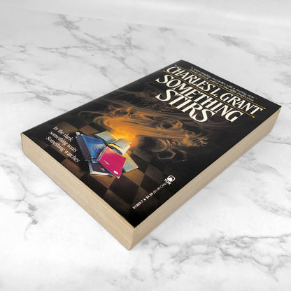 Something Stirs by Charles L. Grant [FIRST PAPERBACK PRINTING] 1993 • TOR Horror