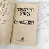 Something Stirs by Charles L. Grant [FIRST PAPERBACK PRINTING] 1993 • TOR Horror