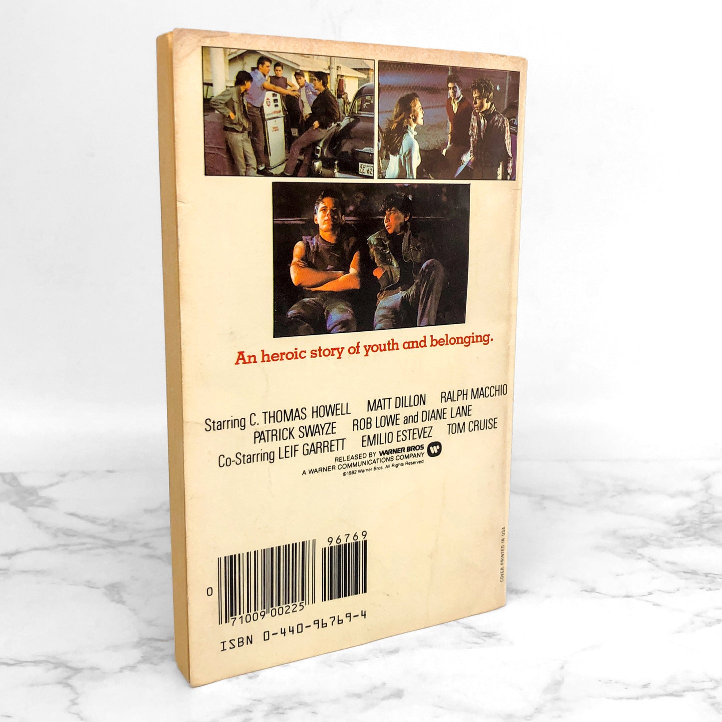 The Outsiders by S.E. Hinton [1983 MOVIE TIE-IN PAPERBACK]