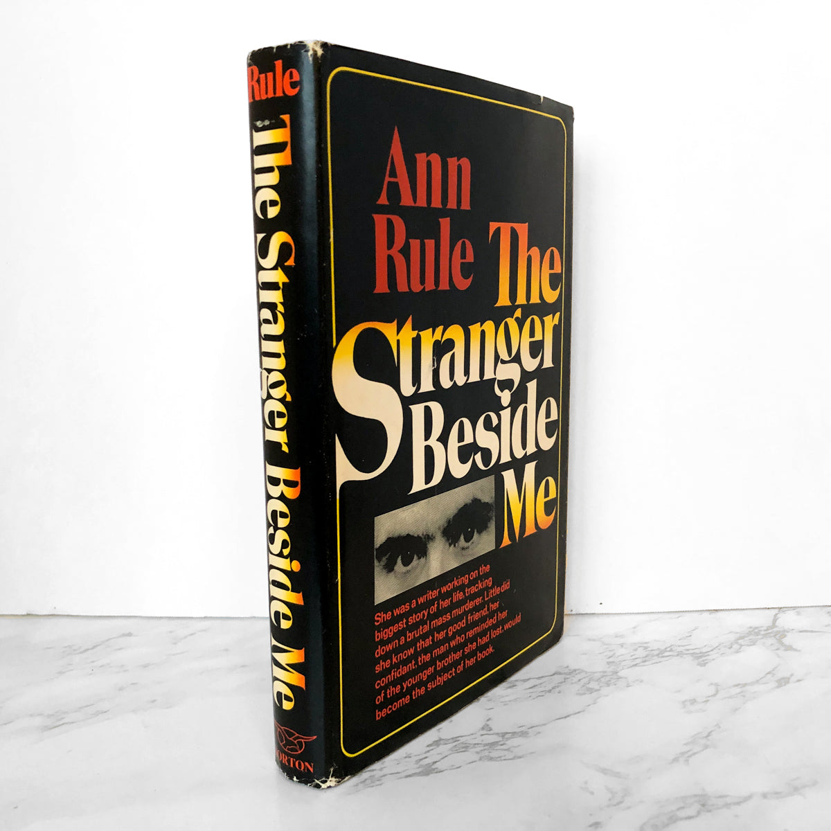 First edition cover of 'The Stranger Beside Me' by Ann Rule depicting a shadowy figure