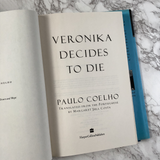 Veronika Decides to Die by Paulo Coelho  [FIRST EDITION / FIRST PRINTING] 1999 - Bookshop Apocalypse